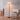 Collis Floor Lamp angled view showing bronze body, spire top, and ø12" weighted base — 62" tall