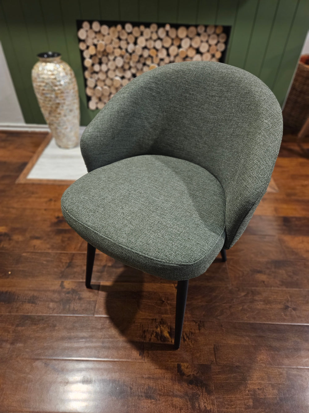 Sereni dining chair photographed by The DIY Pros beside their fireplace