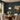 Aurelia white glass schoolhouse pendant light in Gold above a traditional dining table