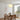 Byron Pendant Light single over a round dining table — centered farmhouse pendant in warm rustic interior