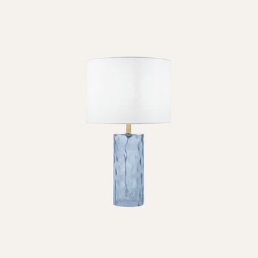 Deniz Glass Table Lamp (Set of 2) with blue glass bases and white fabric shades on wooden nightstands.