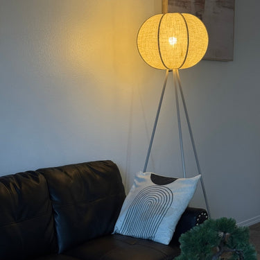Corey Tripod Floor Lamp — full 65.75" view, square beige linen lantern shade on powder-coated iron tripod