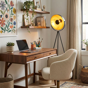 Spoon Tripod Floor Lamp close-up of pivoting spoon head showing warm gold interior shade — mid-century modern design