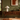 Alba white linen blend table lamp on a wood console in a mid-century room