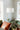 Zenon Floor Lamp close-up of genuine white marble base (ø11") with polished brass pole — natural veining